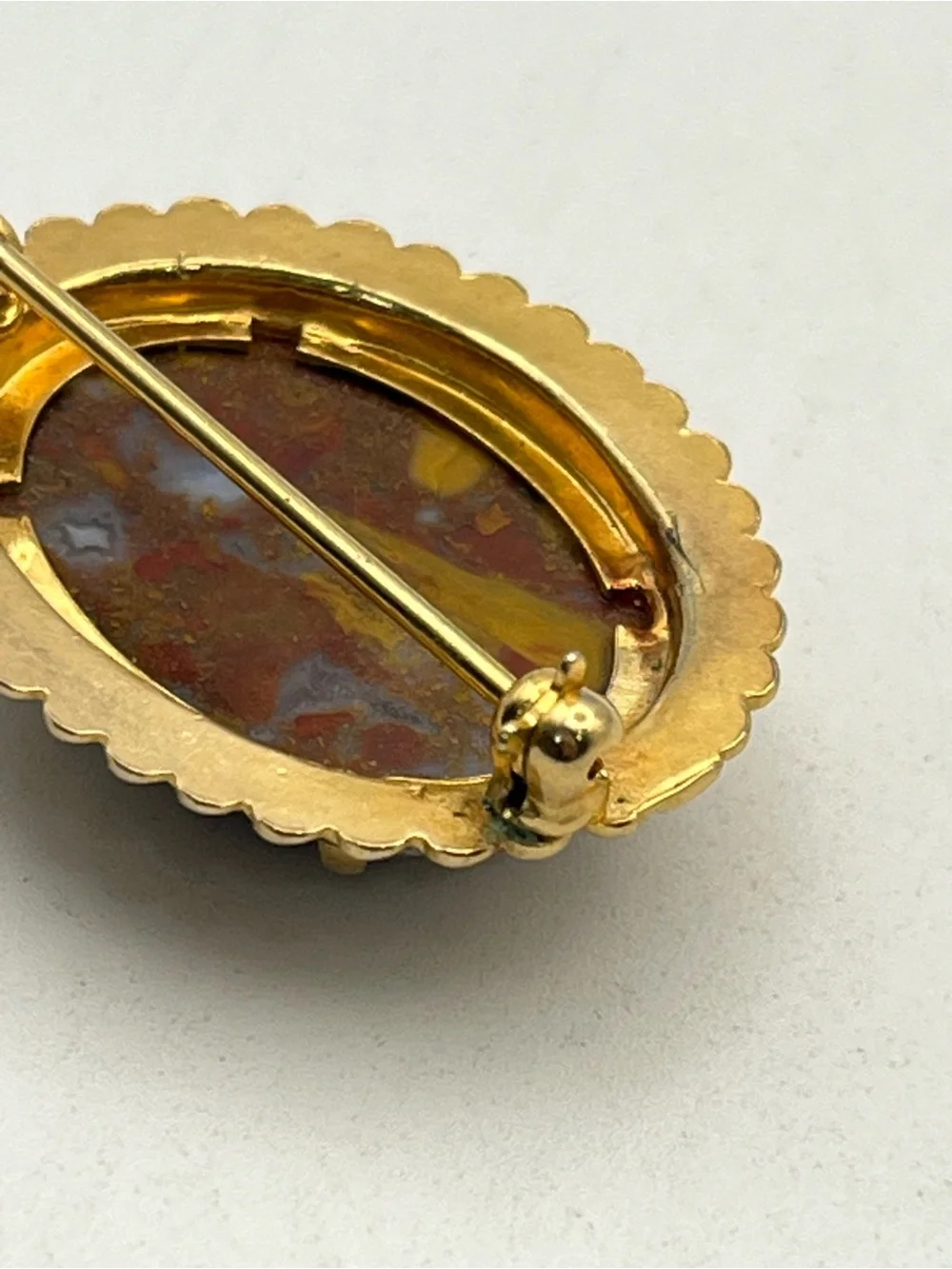 Orange red oval faux stone beaded scalloped edge gold tone vintage brooch pin